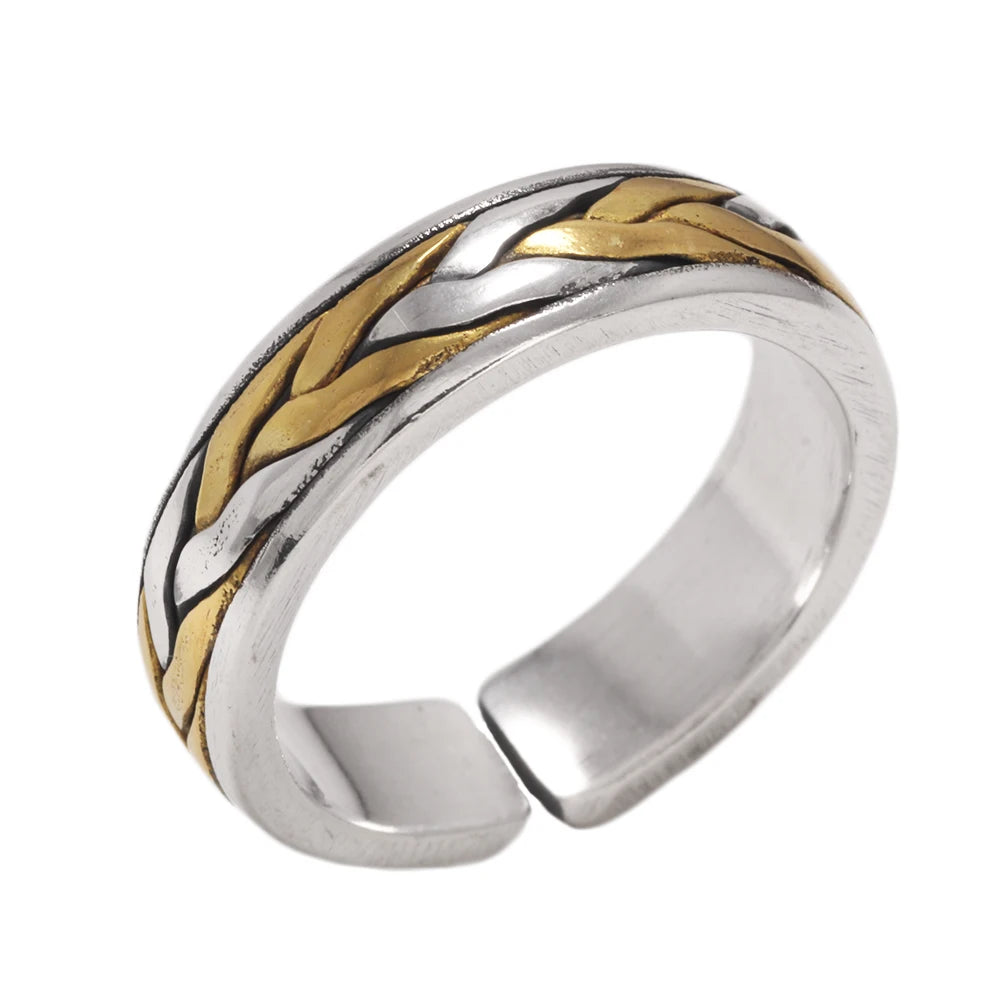A two-tone adjustable ring band featuring a braided pattern of polished gold and silver metal, shown on a clean white background.