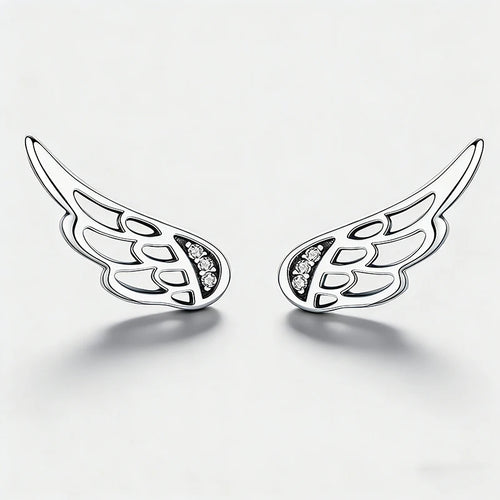 A pair of silver angel wing stud earrings with small clear crystal accents, displayed on a clean white background.